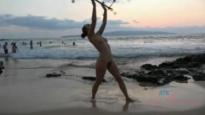 She puts on a show for all at the nude beach